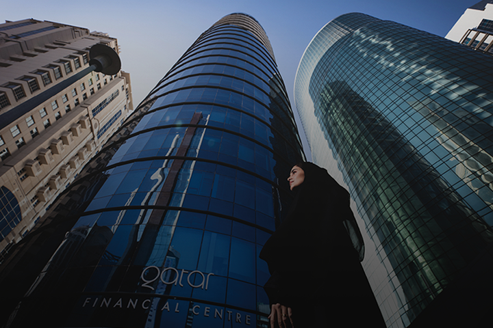 Qatar Financial Centre Tower - with a local Qatari Lady
